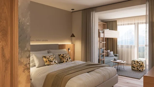 Ein Hotel in Großarl für Aktive | für Genießer | für dich Gemütliches Schlafzimmer mit Doppelbett und angrenzendem Wohnzimmer